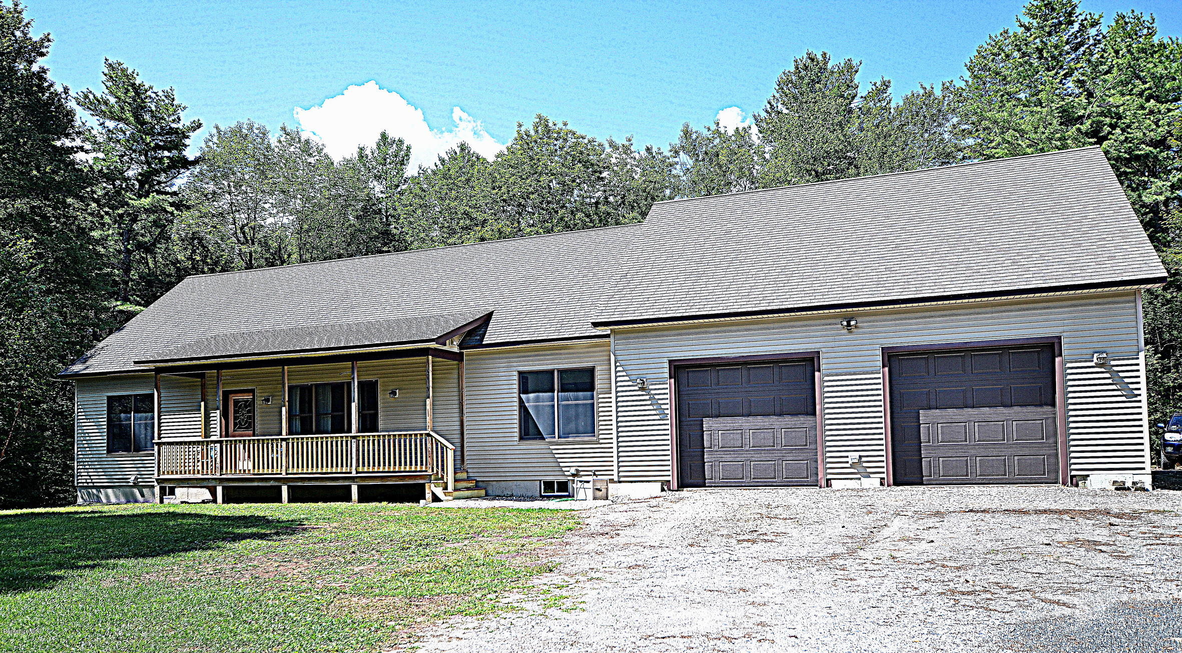 779 Stebbins Road Otis, MA 01253 - Photo 40 of 40 a front view of a house with a yard