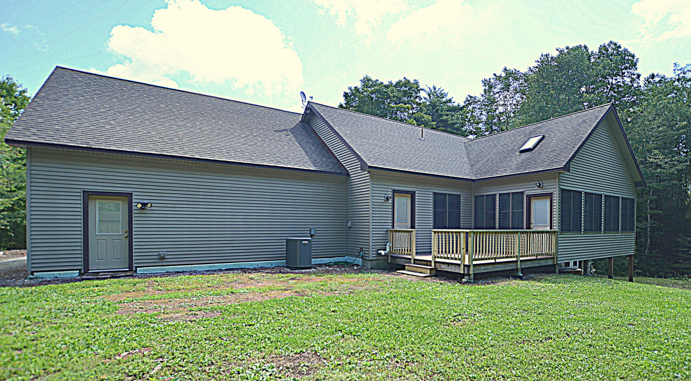 779 Stebbins Road Otis, MA 01253 - Photo 5 of 40 a backyard of a house