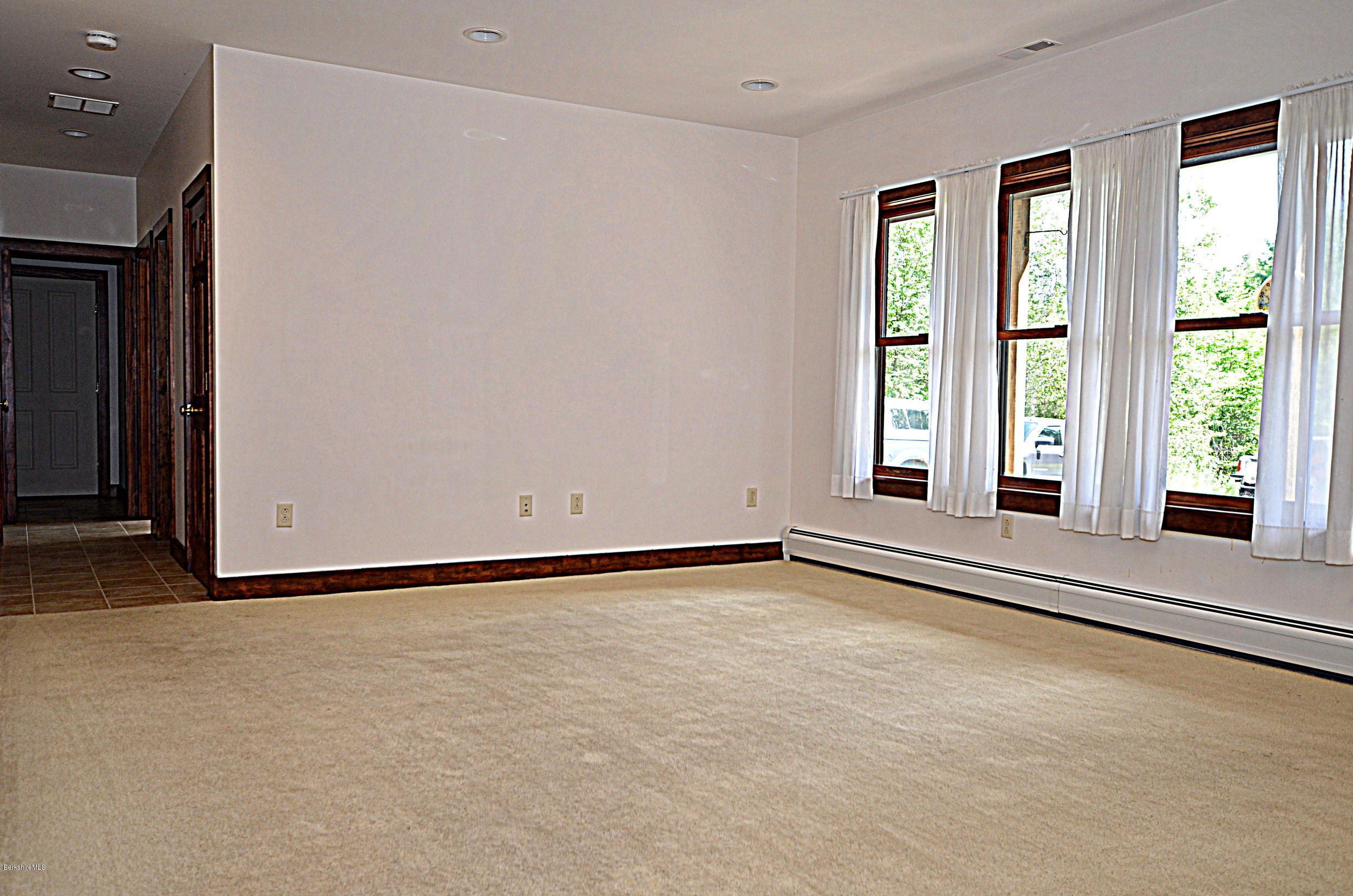 779 Stebbins Road Otis, MA 01253 - Photo 8 of 40 a view of an empty room with a window