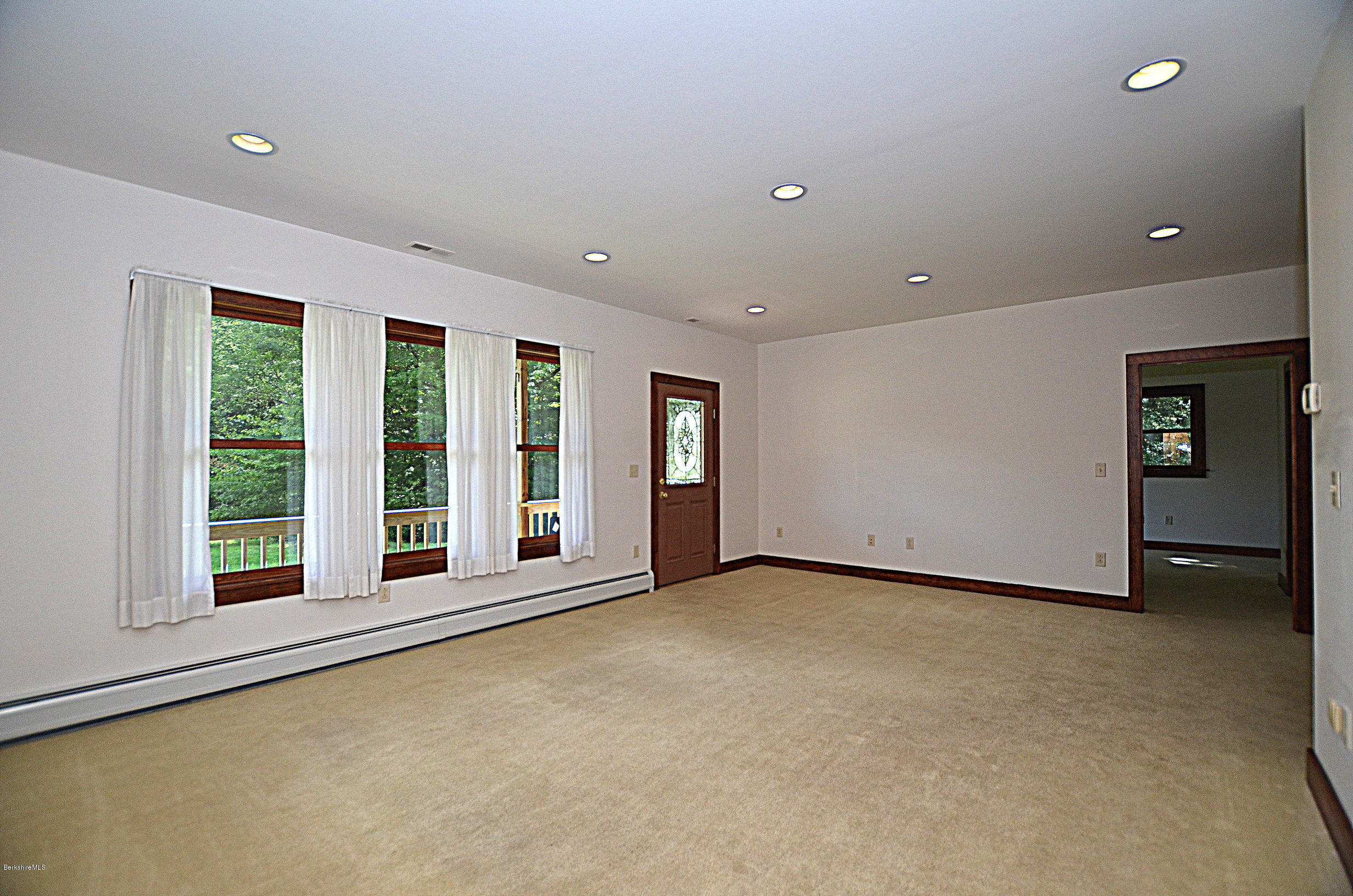 779 Stebbins Road Otis, MA 01253 - Photo 9 of 40 a view of an empty room with a window