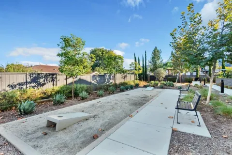 a view of a street with sitting area
