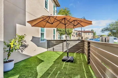 swimming pool view with a seating space