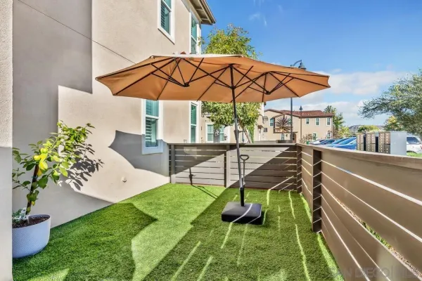 swimming pool view with a seating space