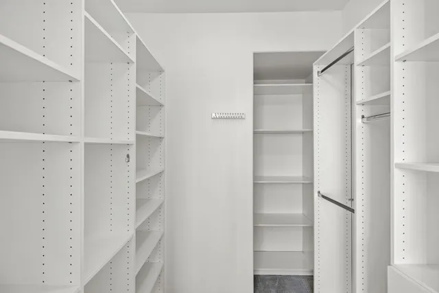 a swimming pool with outdoor seating and yard