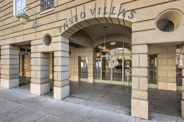 a front view of a building with glass windows
