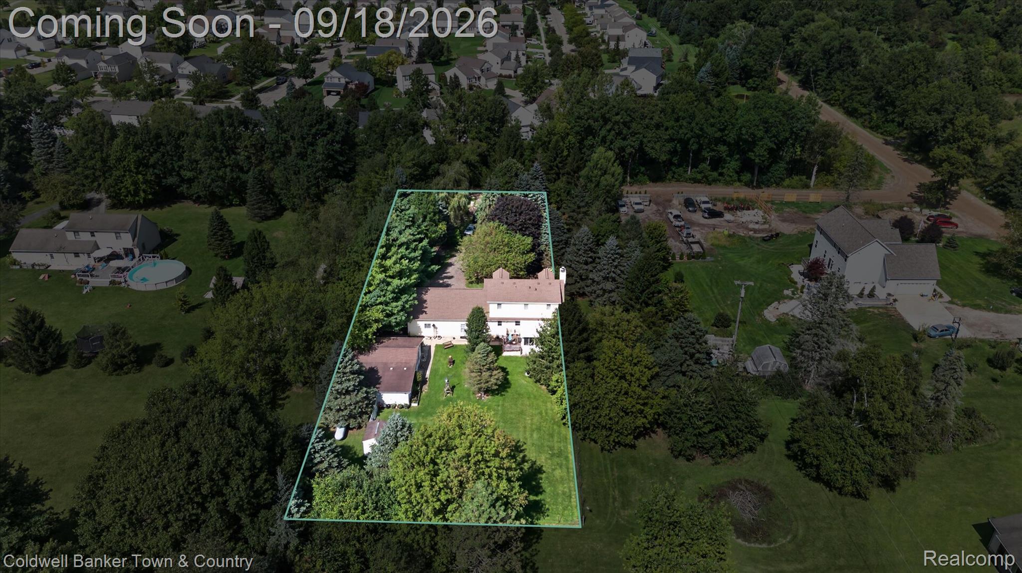 4442 McGunn Road Howell, MI 48843 - Photo 52 of 63 Expansive property featuring a residence, detached structure, and mature trees on a generous lot