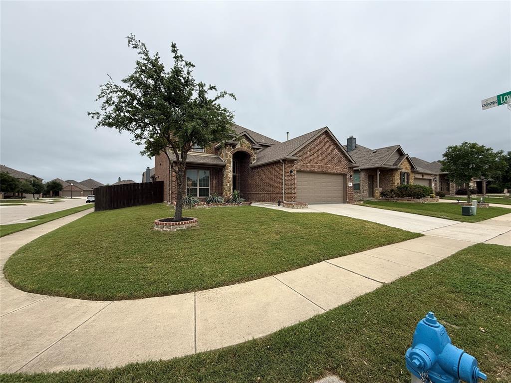 101 Rocky Pine Road McKinney, TX 75072 - Photo 4 of 39 a front view of a house with a yard