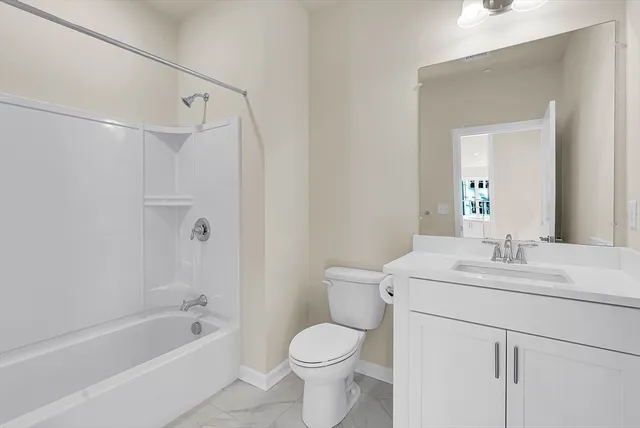 an entryway with a workspace