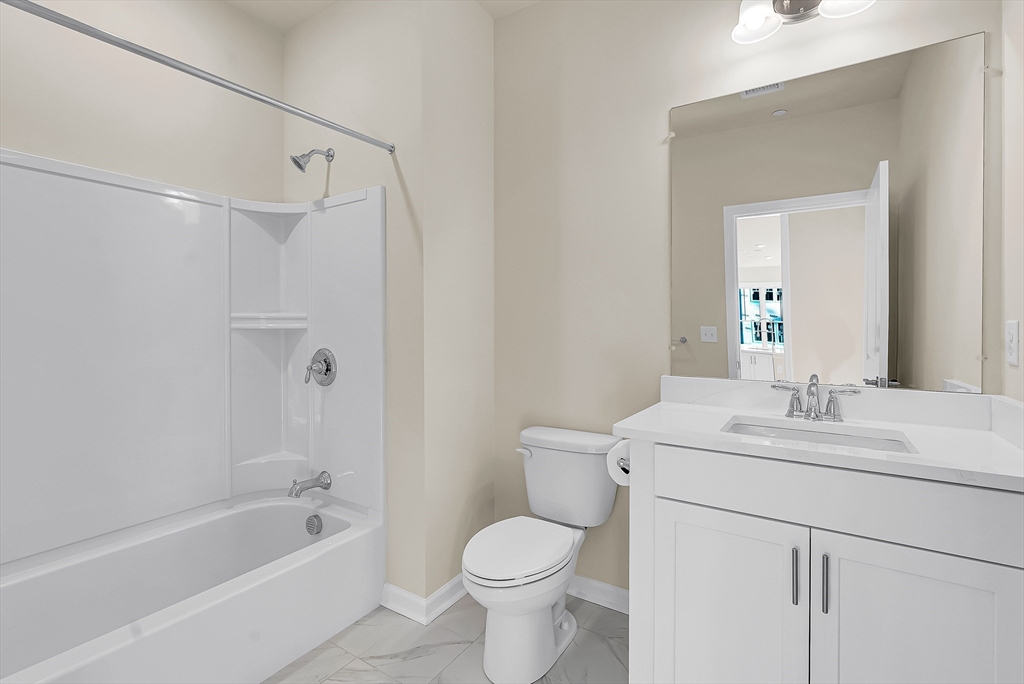 2 Winslow Lane, Unit 201 Grafton, MA 01536 - Photo 25 of 33 a bathroom with a sink toilet and shower