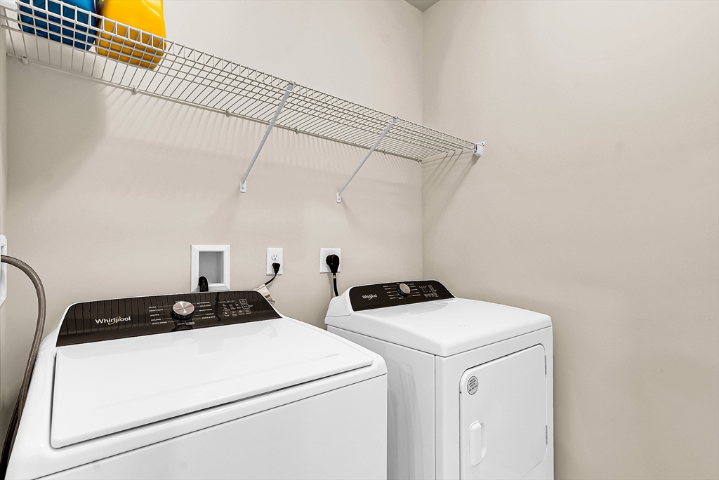 2 Winslow Lane, Unit 201 Grafton, MA 01536 - Photo 27 of 33 a utility room with dryer and washer