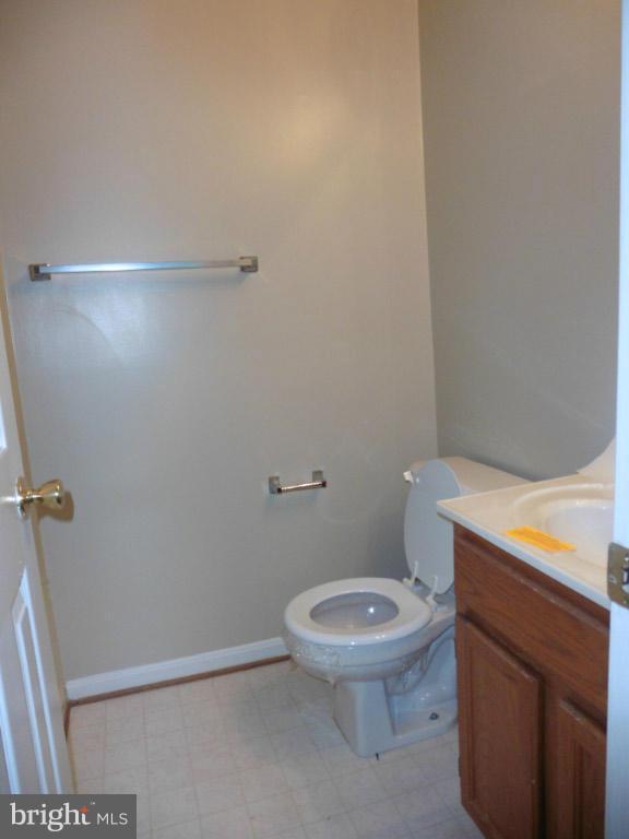 8817 Ritchboro Road District Heights, MD 20747 - Photo 12 of 19 a white toilet sitting next to a shower