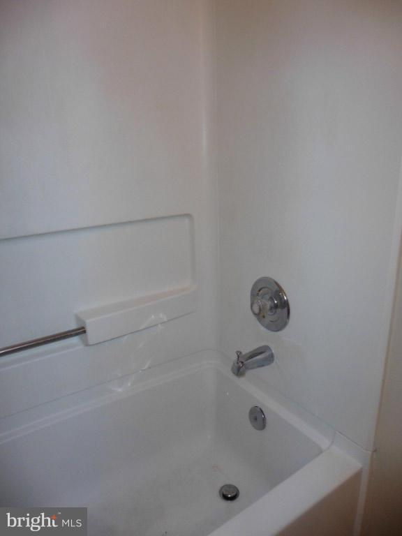 8817 Ritchboro Road District Heights, MD 20747 - Photo 13 of 19 a close up of a bathtub