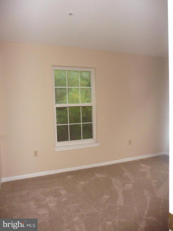 8817 Ritchboro Road District Heights, MD 20747 - Photo 15 of 19 an empty room with a window