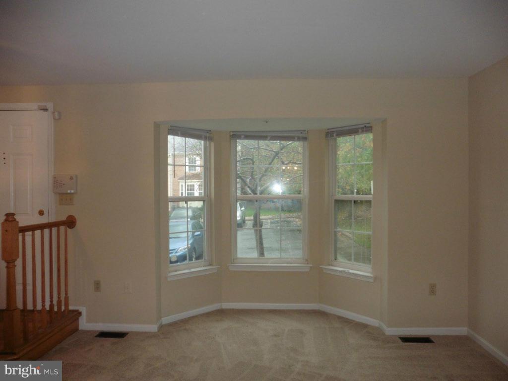 8817 Ritchboro Road District Heights, MD 20747 - Photo 4 of 19 an empty room with windows