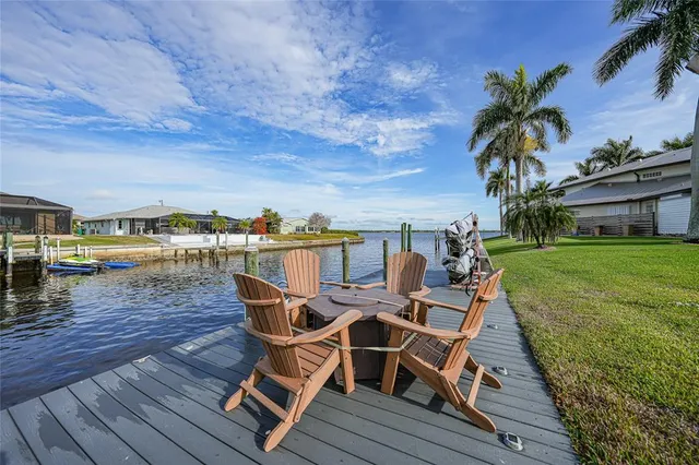a view of a chairs and table on the wooden floor