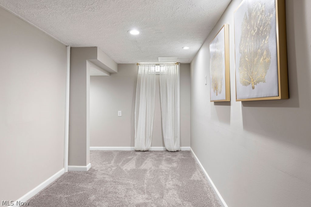 9620 David Road Garfield Heights, OH 44125 - Photo 30 of 36 Carpeted empty room with a textured ceiling