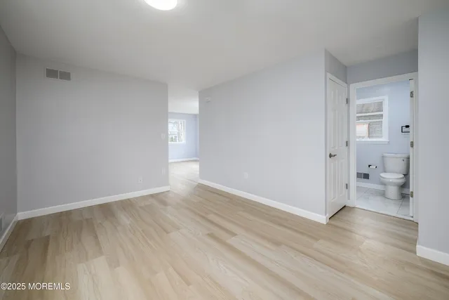 a view of an empty room and a gallery