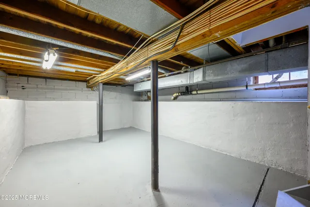 a view of a room with wooden walls