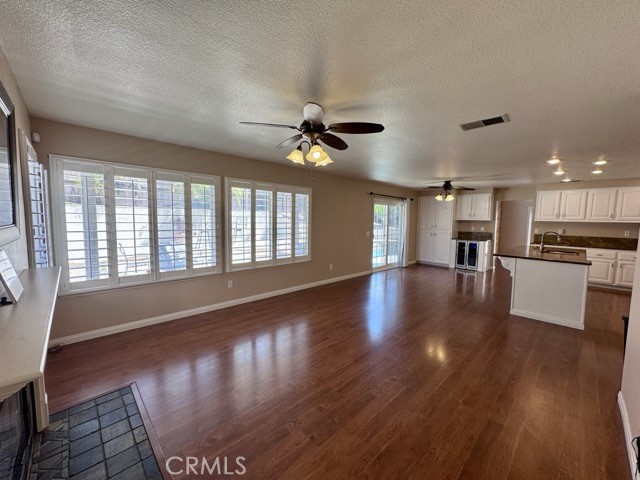 32948 Levi Court Temecula, CA 92592 - Photo 20 of 59 a view of an empty room with wooden floor and a window