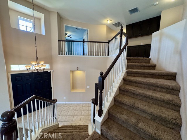 32948 Levi Court Temecula, CA 92592 - Photo 28 of 59 a view of entryway and hall with wooden floor