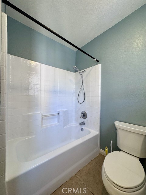 32948 Levi Court Temecula, CA 92592 - Photo 35 of 59 a white toilet sitting next to a bath tub and shower