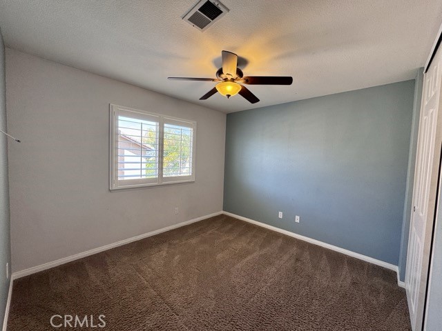 32948 Levi Court Temecula, CA 92592 - Photo 36 of 59 an empty room with windows and fan
