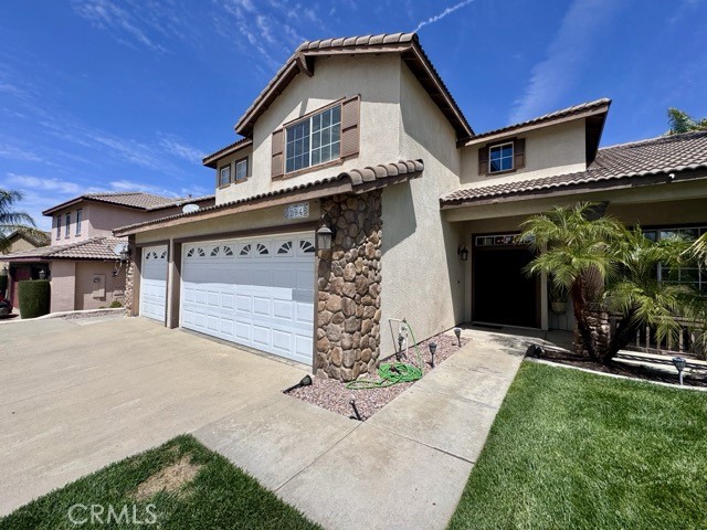 32948 Levi Court Temecula, CA 92592 - Photo 4 of 59 a front view of a house with a yard