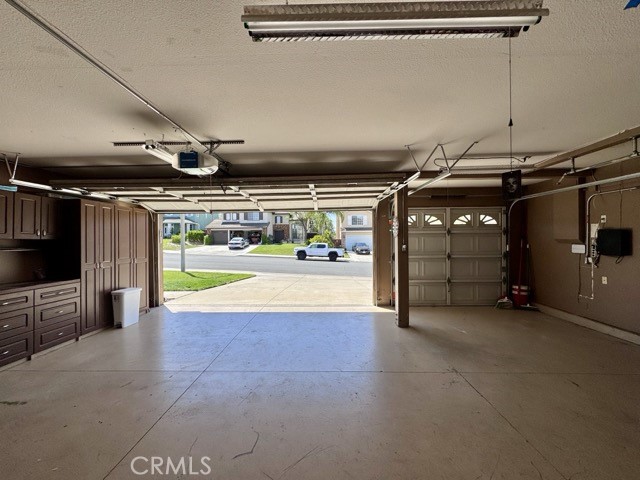 32948 Levi Court Temecula, CA 92592 - Photo 47 of 59 a view of an empty room with wooden floor