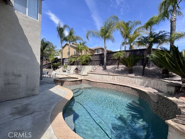 32948 Levi Court Temecula, CA 92592 - Photo 58 of 59 a view of swimming pool with outdoor seating and plants