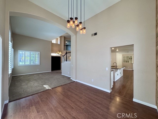 32948 Levi Court Temecula, CA 92592 - Photo 10 of 59 a view of a livingroom with wooden floor and stairs