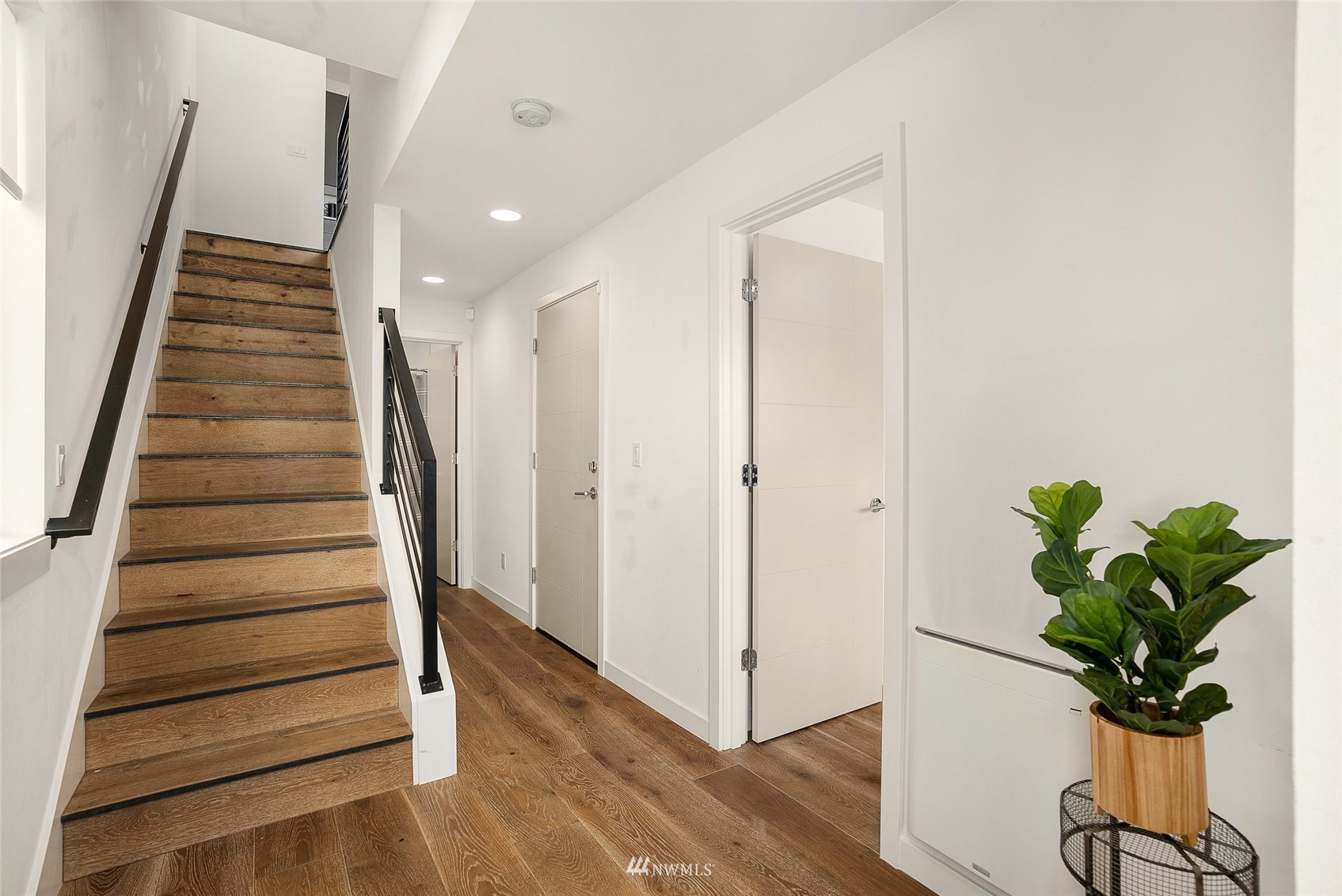 4207 Southwest Frontenac Street Seattle, WA 98136 - Photo 3 of 36 a view of entryway with wooden floor