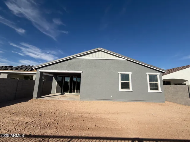 a house view with a backyard space