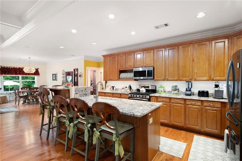 7131 Ridge Road Hiram, GA 30141 - Photo 13 of 63 a large kitchen with lots of counter space a sink and appliances