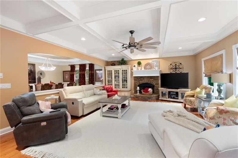 7131 Ridge Road Hiram, GA 30141 - Photo 18 of 63 a living room with furniture a fireplace and a flat screen tv