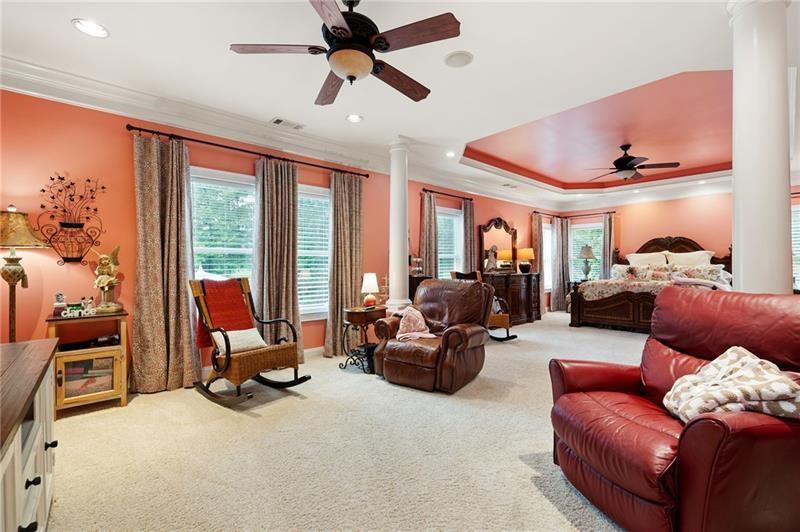 7131 Ridge Road Hiram, GA 30141 - Photo 29 of 63 a living room with furniture gym equipment and a large window