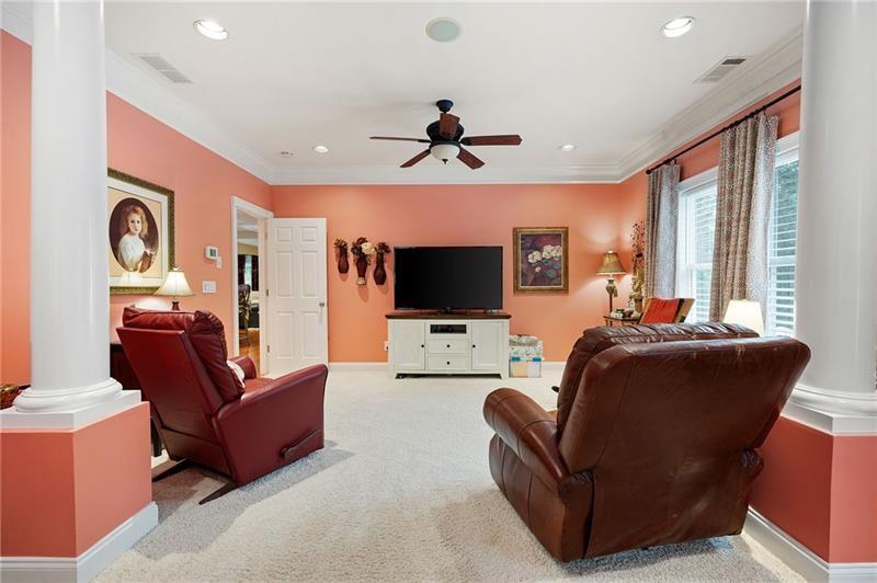 7131 Ridge Road Hiram, GA 30141 - Photo 30 of 63 a living room with furniture and a flat screen tv