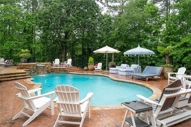 7131 Ridge Road Hiram, GA 30141 - Photo 47 of 63 a view of a swimming pool with lounge chairs in the patio
