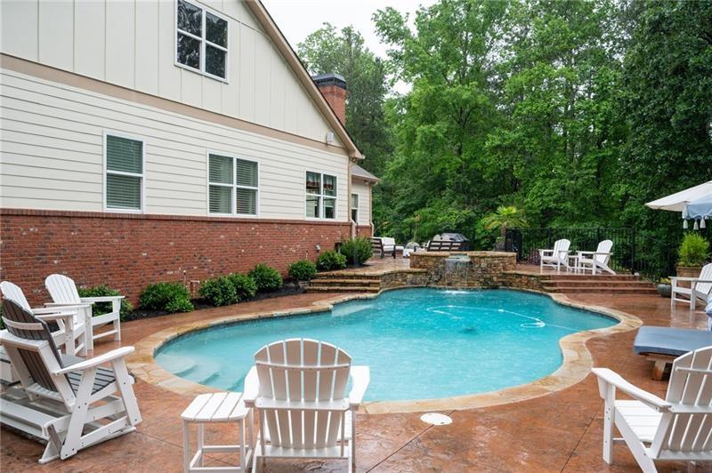 7131 Ridge Road Hiram, GA 30141 - Photo 49 of 63 a view of a house with swimming pool and sitting area