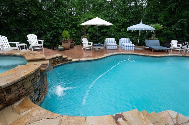 7131 Ridge Road Hiram, GA 30141 - Photo 50 of 63 a outdoor view with a table and chairs under an umbrella