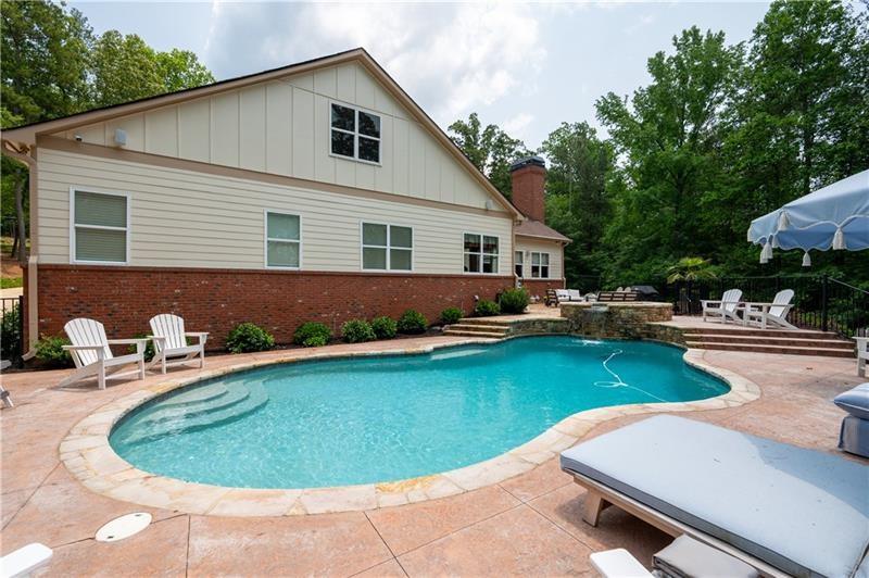 7131 Ridge Road Hiram, GA 30141 - Photo 52 of 63 a view of a swimming pool with lounge chair