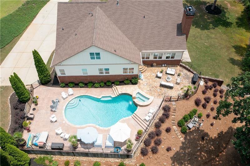 7131 Ridge Road Hiram, GA 30141 - Photo 55 of 63 an aerial view of a house with a swimming pool and outdoor seating