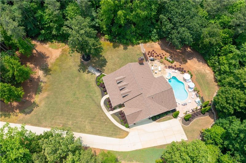 7131 Ridge Road Hiram, GA 30141 - Photo 56 of 63 an aerial view of a house with outdoor space and swimming pool
