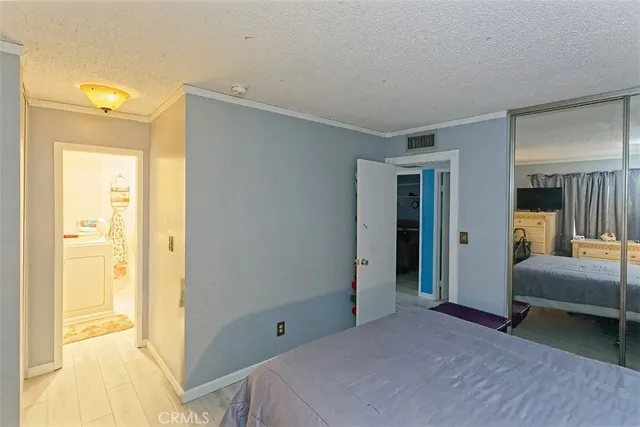 a room that has a lot of furniture and storage