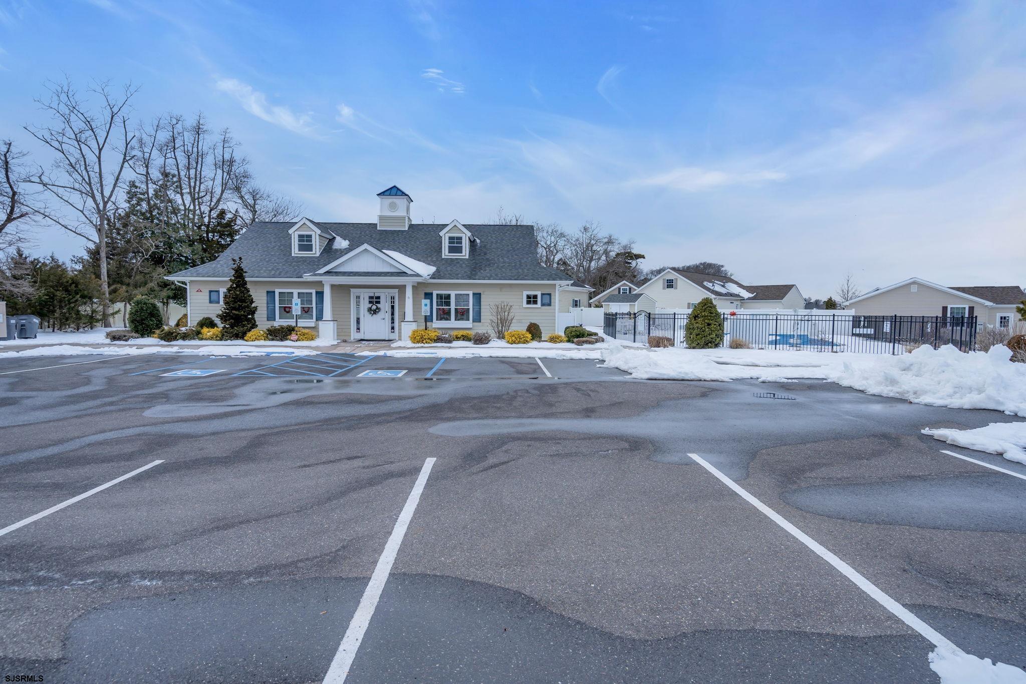 2058 South Shore Road, Unit 104 Marmora, NJ 08230 - Photo 20 of 20 a front view of residential houses with city view