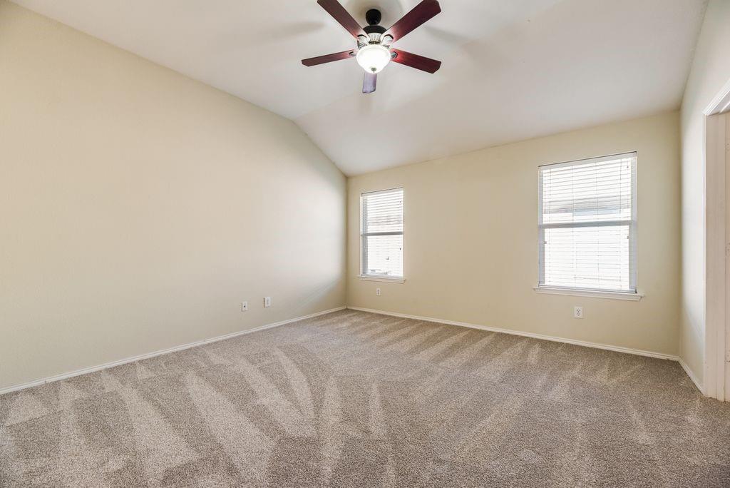 2721 Lone Ranger Trail Little Elm, TX 75068 - Photo 16 of 23 a view of an empty room with a window