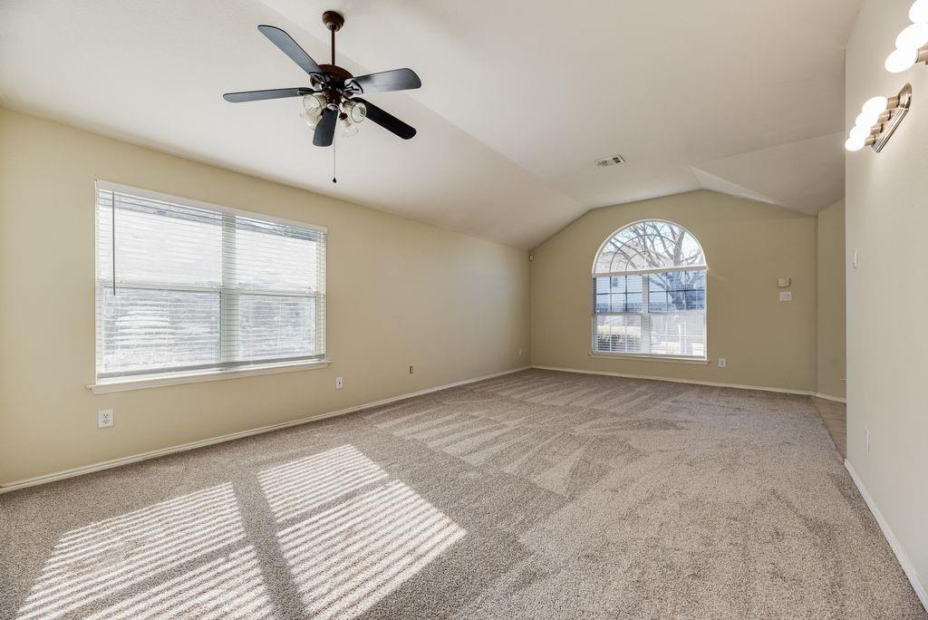 2721 Lone Ranger Trail Little Elm, TX 75068 - Photo 6 of 23 a view of an empty room with a window