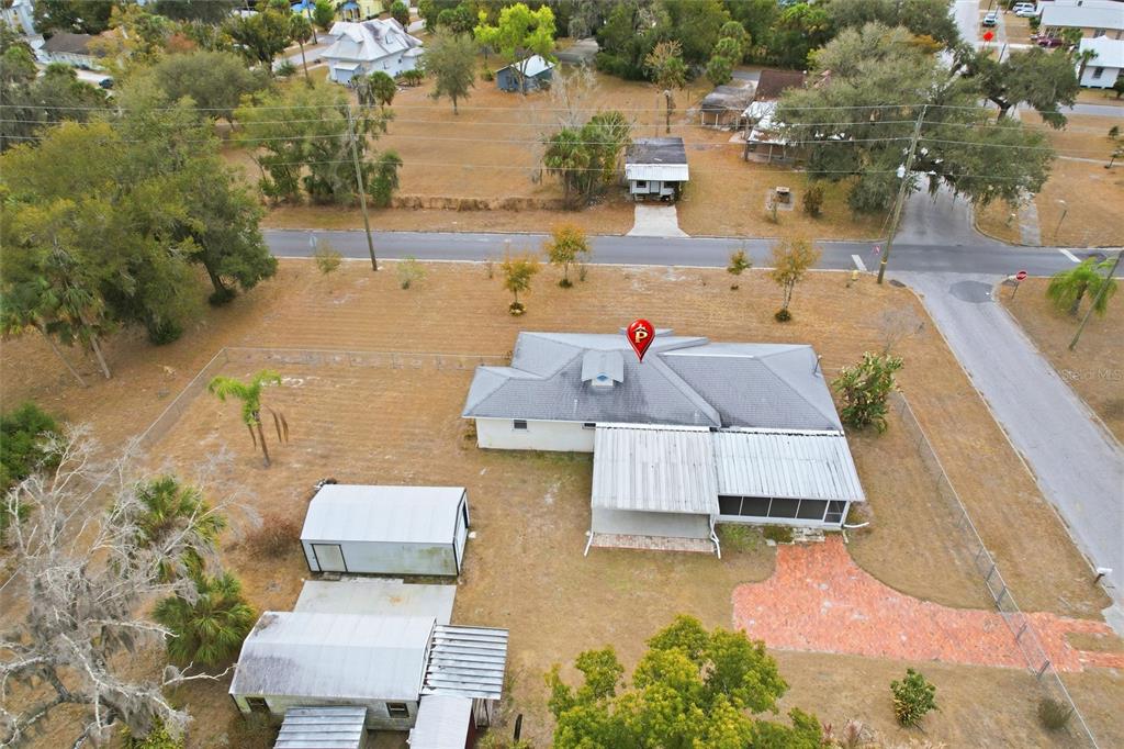 404 West Whidden Street Arcadia, FL 34266 - Photo 34 of 34 a aerial view of a house with swimming pool and large trees
