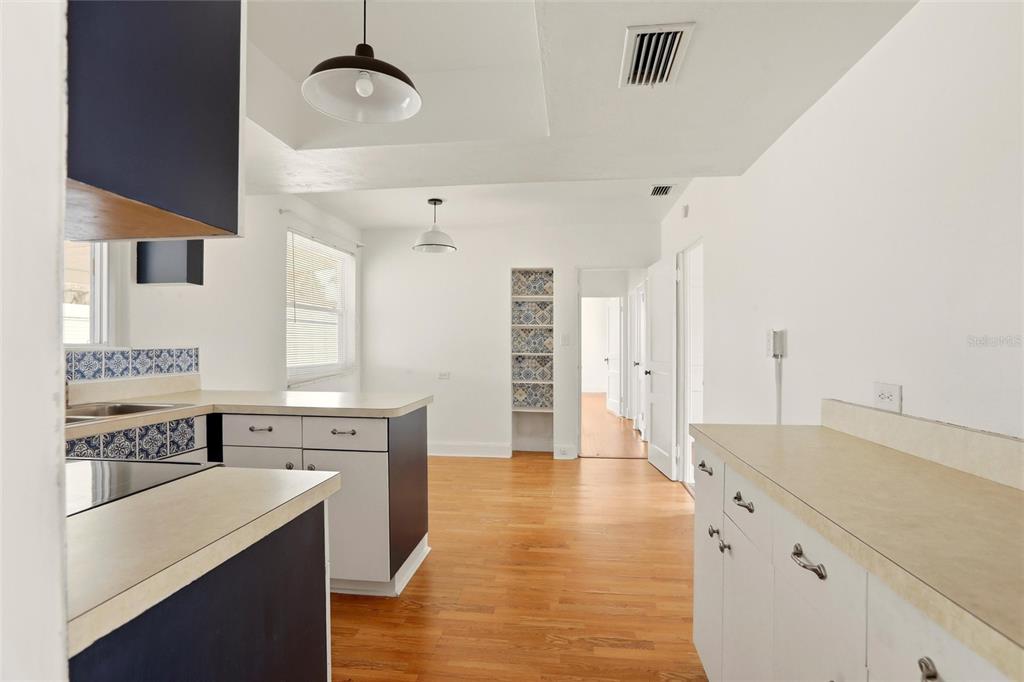404 West Whidden Street Arcadia, FL 34266 - Photo 7 of 34 a large white kitchen with a stove top oven