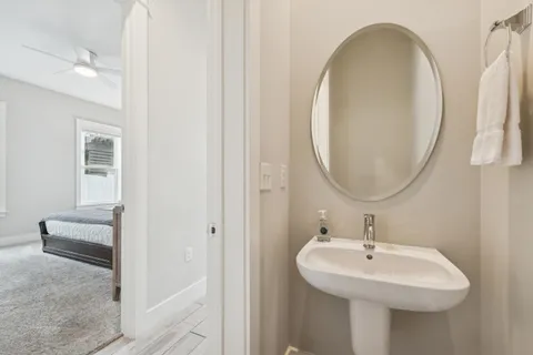 a bathroom with a sink and a mirror
