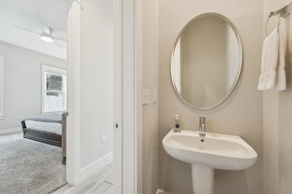a bathroom with a sink and a mirror
